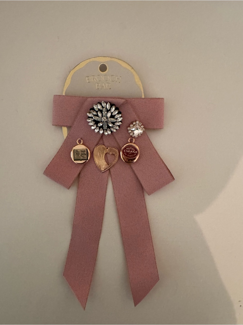 Anthropologie Dusty Rose Ribbon Brooch with Crystal and Gold Charms NWT